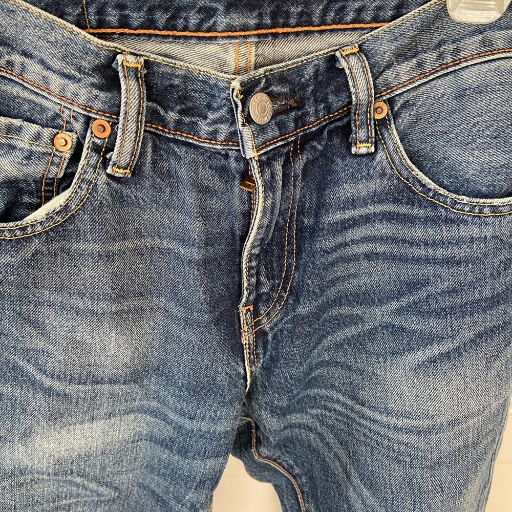 90’s style Levi’s in dark denim with great fade